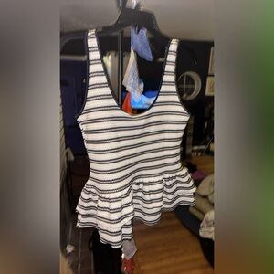 Divided Black and White Striped Peplum Tank Top